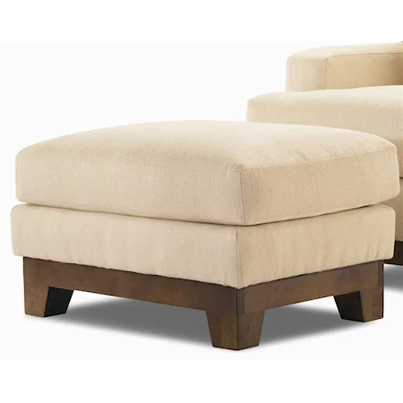 Upholstered Ottoman with Exposed Wood